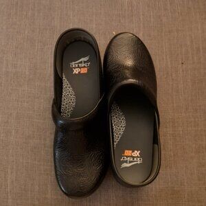 Dansko "Tooled" black floral clog design, size 11